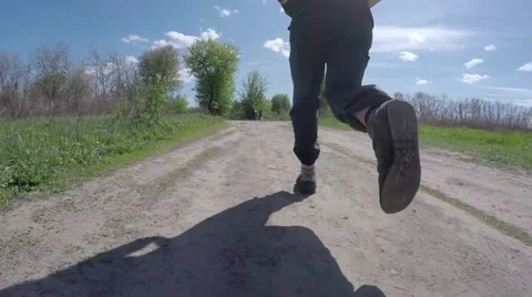 Running man on the ground way Stock Footage 64378436