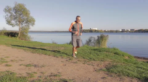 Running man on the lake 스톡 동영상 41752074