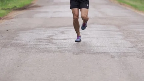 Running Man At a Park. Marathon Runner Jog On Forest. Stock Footage 132057152