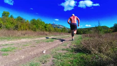 Running man on the road Stock Footage 169872674