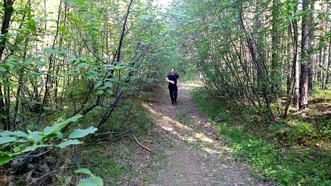 Running man through the forest Stock Footage 156187118