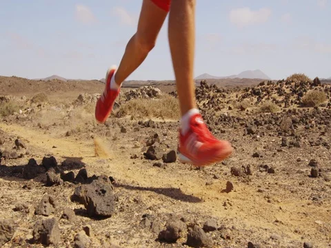Running man trail running in desert - male runner running fast Stock Footage 75059132