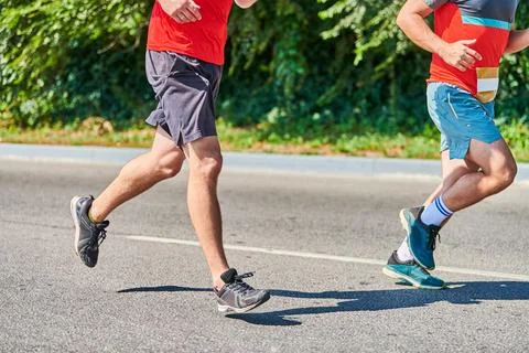 Running men. Stock Photos