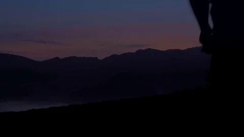 Running on the mountain at sunset Stock-Footage 77915547