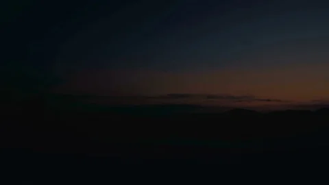 Running on the mountain at sunset Stock Footage 77915555