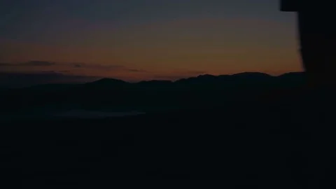 Running on the mountain at sunset Stock Footage 77915581