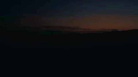 Running on the mountain at sunset Stock Footage 77915585