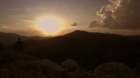 Running on the mountain at sunset Stock Footage 78569693