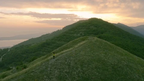 Running in the Mountains. Stock Footage 108626815