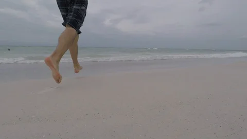 Running into the Ocean Stock Footage 87193575