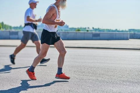 Running old man. Stock Photos