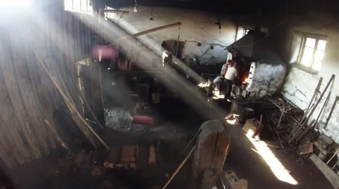 Running an old smithy in the glow and smoke a general plan Stock Footage 46421988