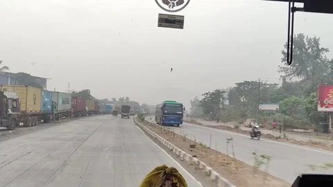Running outside the car window, with trees and a cloudy sky Stock Footage 293243494
