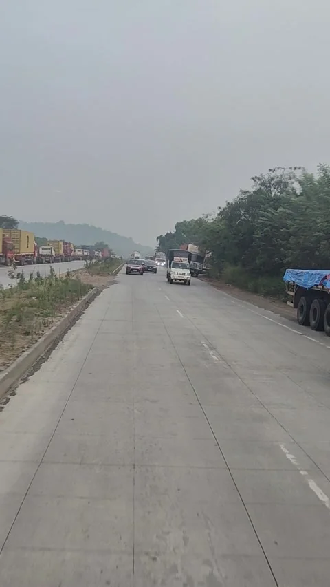 Running outside the car window, with trees and a cloudy sky Stock Footage 293243995