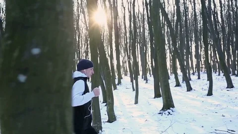 Running in the park among the trees 스톡 동영상 77067066