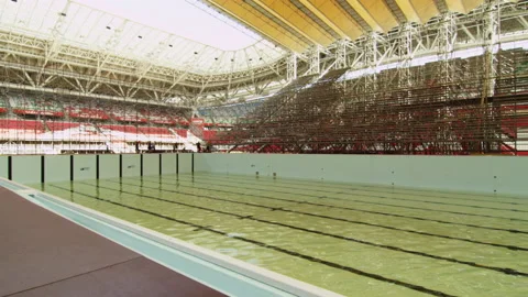 Running path around pool loaded materials and water in basin Stock Footage 234322497