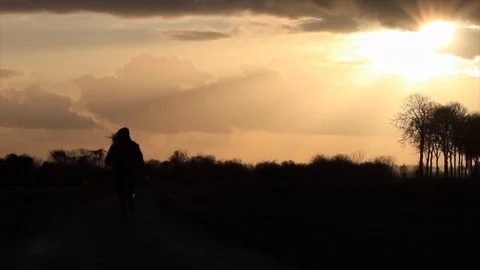 Running in the rain with the apocalyptic sunset 스톡 동영상 126711500