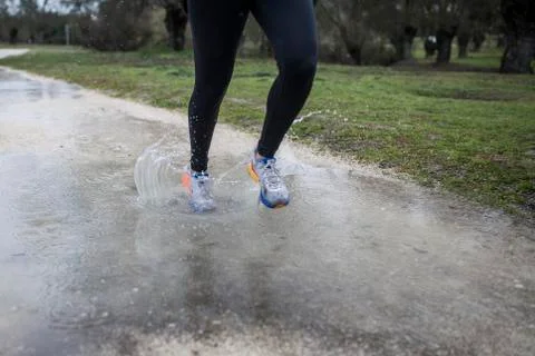 Running in the rain Stock Photos