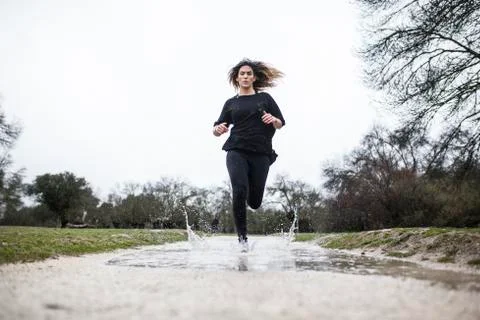 Running in the rain Stock Photos