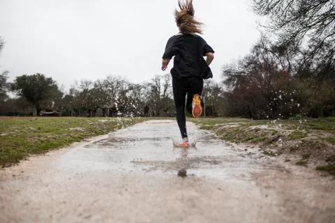 Running in the rain Stock Photos