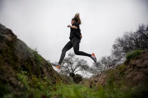 Running in the rain Stock Photos