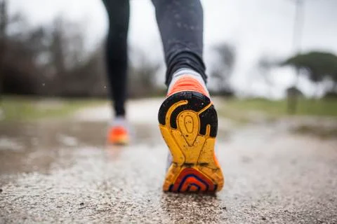 Running in the rain Stock Photos