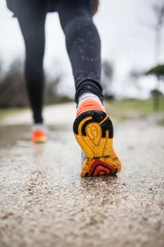 Running in the rain Stock Photos
