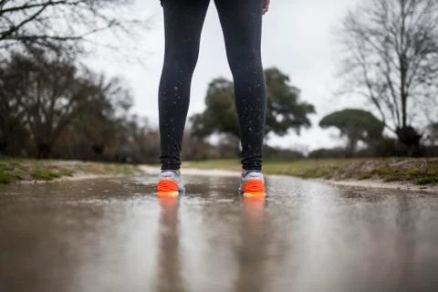 Running in the rain Stock Photos