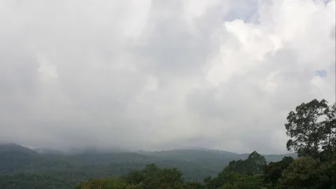Running rainy cloud over the mountain Stock Footage 81254004