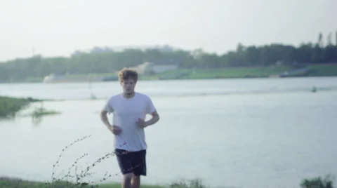 Running by the river Stock Footage 40767910