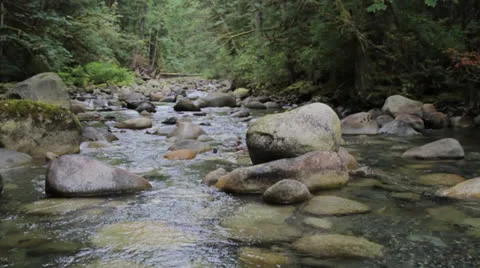 Running river water 4 Stock Footage 23424757