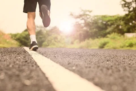 Running on the road. Fotos Stock