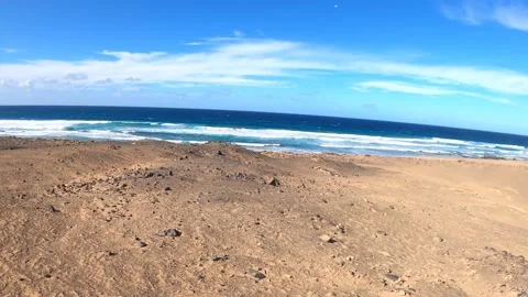 Running on Roque del moro beach, Fuerteventura Stock Footage 164880115