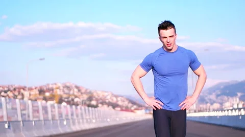 Running runner man athlete training outdoors exercising on mountain road at s Stock Footage 67332527