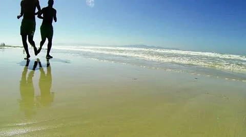 Running in the sand Stock Footage 22226908