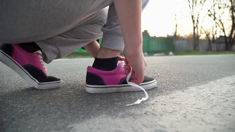 Running shoes and runner sports smartwatch Stock Footage