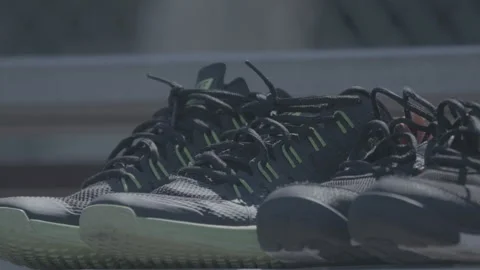 Running Shoes Left on Bench Stock Footage 154001573