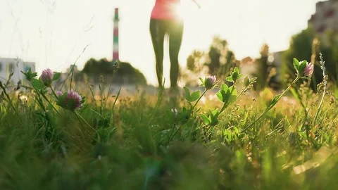 Running shoes - woman tying shoe laces. Slow motion Stock Footage