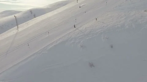 Running ski lift and freeride of snowboarder. Stock Footage 59592055