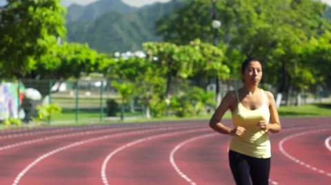 Running a Stadium track Stock Footage 32971081
