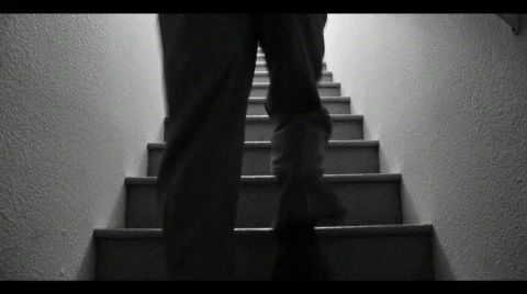 Running up stair steps Stock Footage