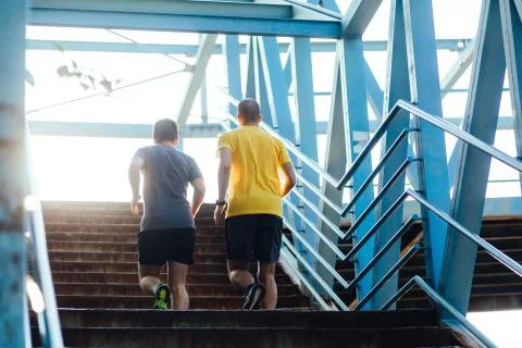 Running up the staircase Stock Photos