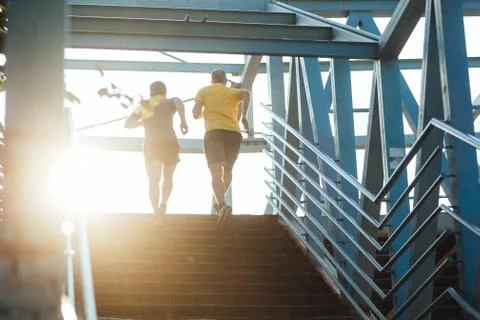 Running up the staircase Stock Photos