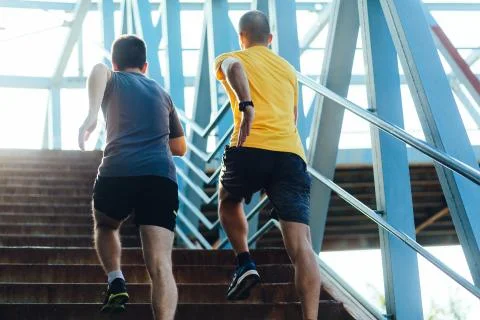 Running up the staircase Stock Photos