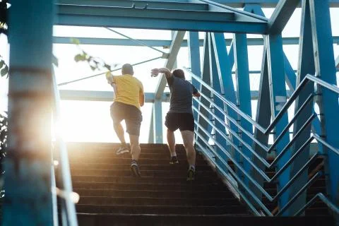 Running up the staircase Stock Photos