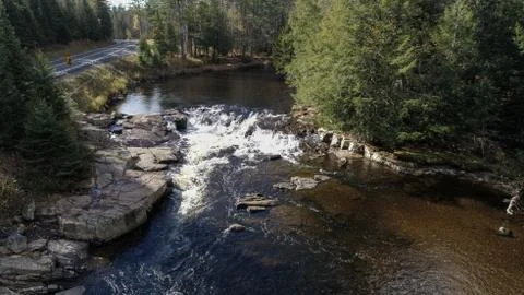 Running Stream Through Rocks and Stones Stock Photos