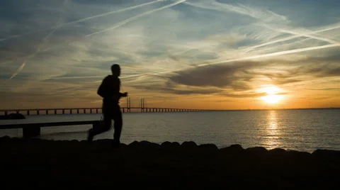Running at sunset Stock Footage 49608620