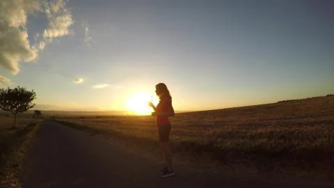 Running at sunset. Stock Photos