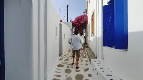 Running through podromos paros in slow motion Stock Footage 277863429