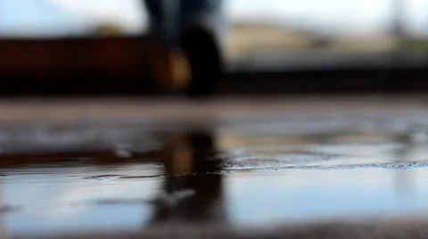 Running through a puddle Video stock 54411917
